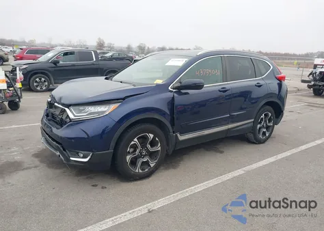 2017 Honda Cr-V Touring z USA, uszkodzony, nr VIN 5J6RW2H90H1012038